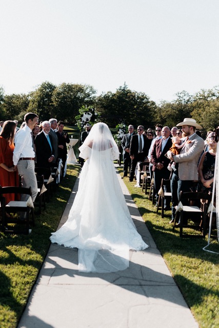 Lakeside ceremony at Peach Creek Ranch College Station wedding venue